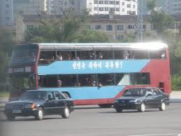26 A double-decker bus in Pyongyang! And there’s a Mercedes-Benz car too!