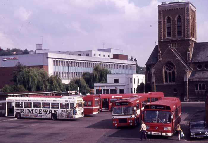 Nationals are seen with a Marshall bodied Bristol RE in Guildford Bus Station