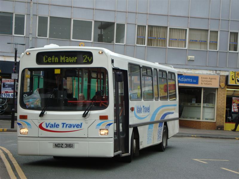 GHA Coaches Wright Handybus bodied Dennis Dart in Wrexham in March 2009