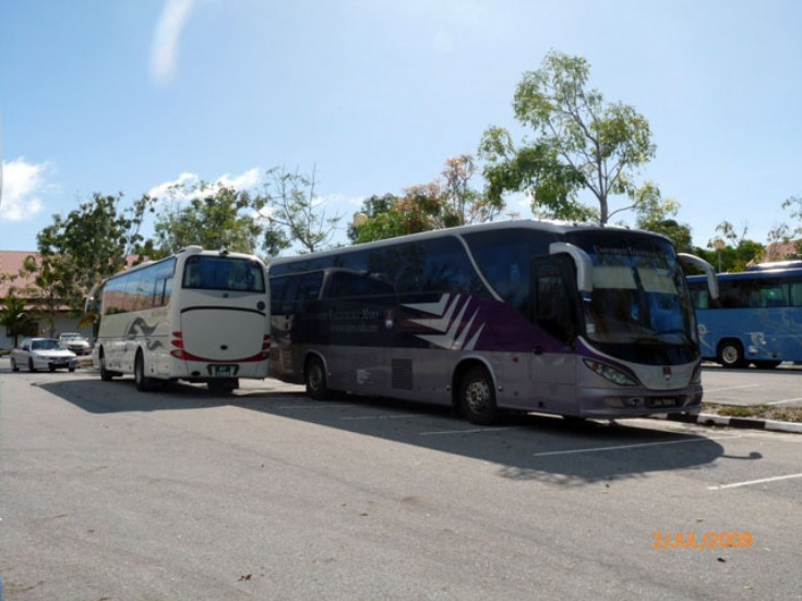 Yutong 47 seater coach operated by Bengkel Kereta Berakas (BKB) Coach and Bus Rentals Unit and a Scania Irizar coach