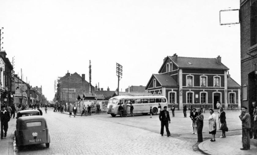 1952 The station at Billy Montigny showing a Delahaye bus at the railway station.