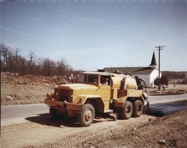 1952 International M-61 to spread asphalt at Wolters Air Force Base