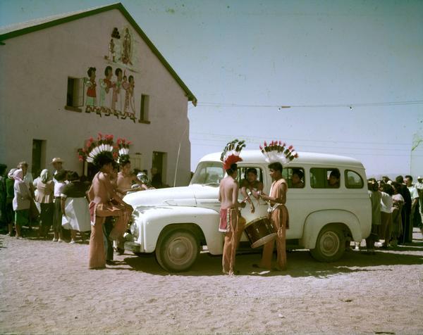 1953 American-Indian Youth Fathered Around International truck