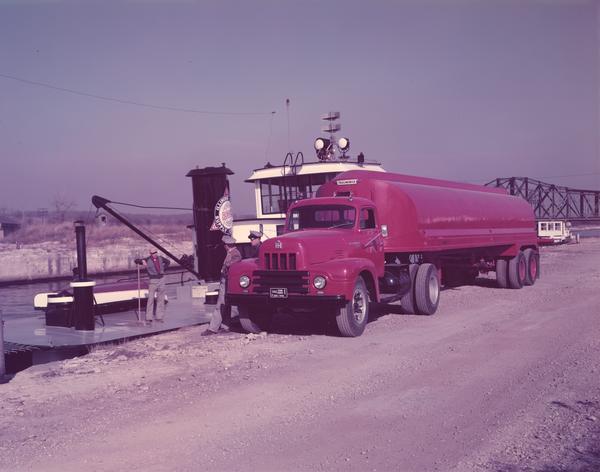 1953 International Model RP-195 roadliner truck with attached trailmobile oil tanker.