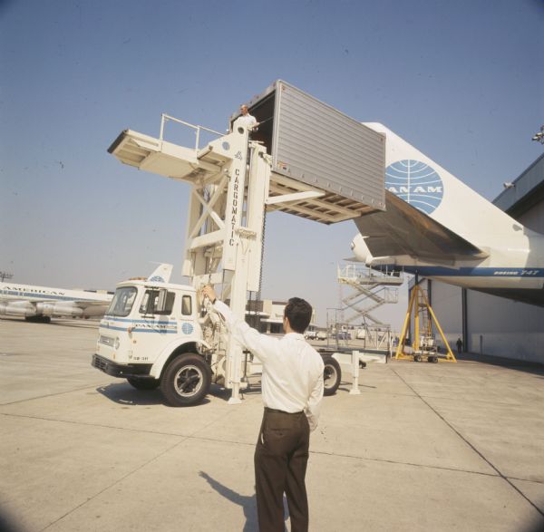 1970 International truck carrying prepacked airline food to Pan American World Airways Boeing 747 airplane