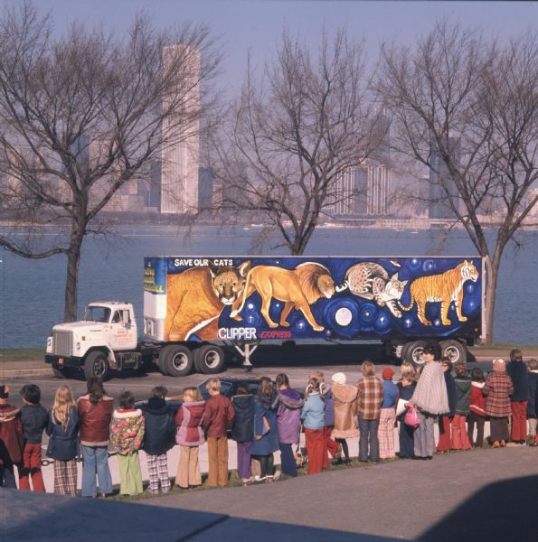 1975 Children Looking at Save Our Cats Mural on Trailer