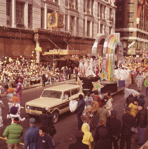 1976 International Scout Truck Towing Colorful Float in Parade