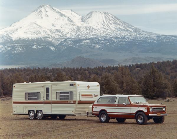 1977 Scout Traveler with Terry Camper in the Mountains