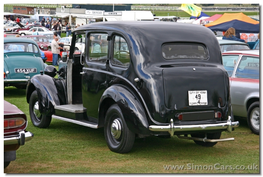 Austin FX3 Taxi.  Produced from 1948 until 1958, the FX3 sold 13700 units.  FX3s were not fitted with a front nearside door, as this was used for storing luggage.